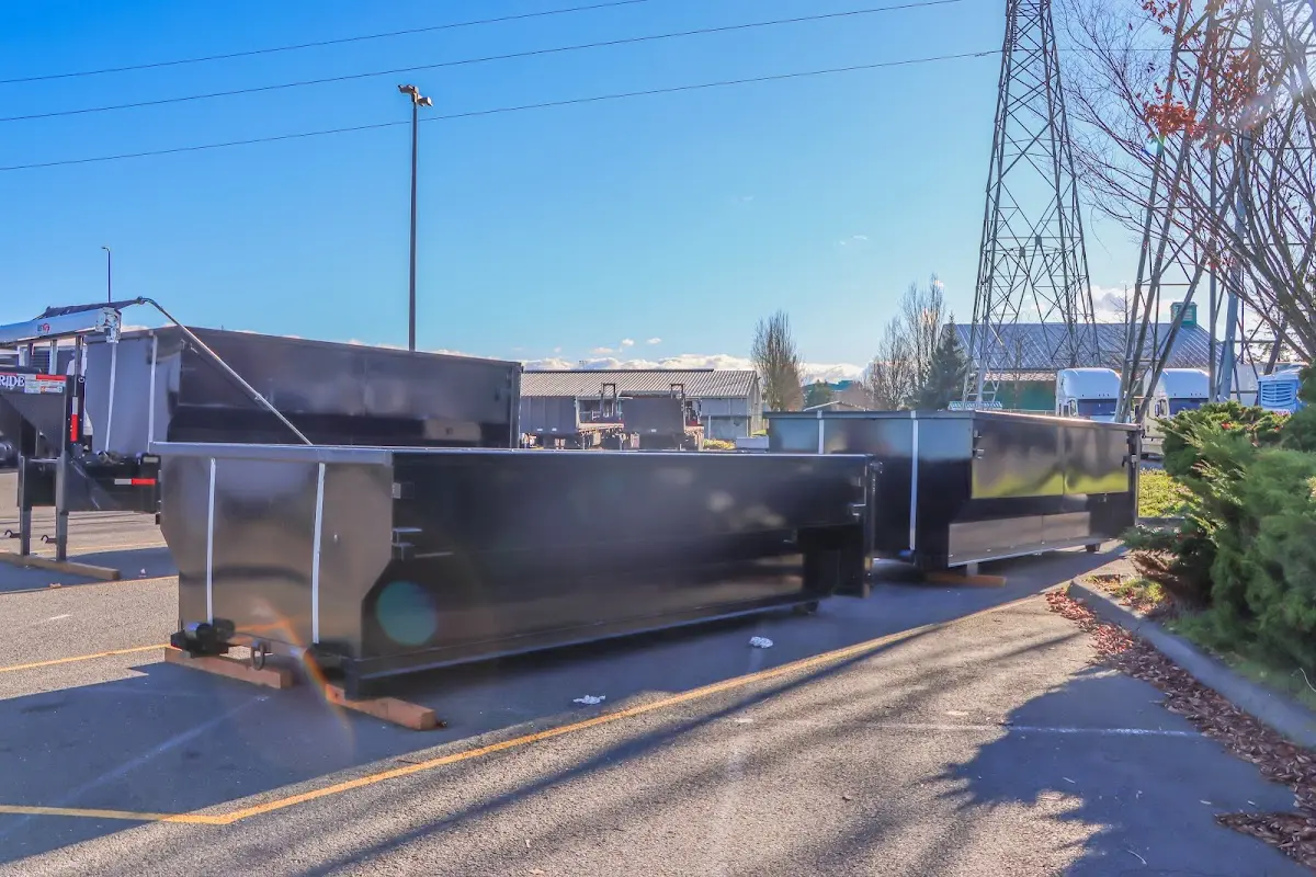 Roll-off dumpster ready for waste disposal at job site for 2 Yard Dumpster Rental in Poulsbo